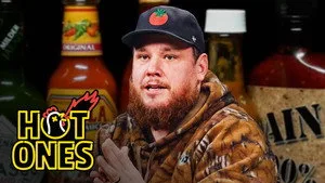 Luke Combs Feels a Heat Hurricane While Eating Spicy Wings